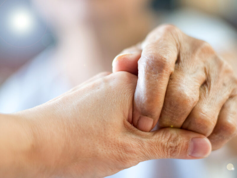 1800x1200 caregivers hand other