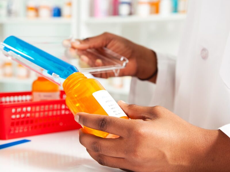 1800x1200 pharmacist filling prescription pill bottle other