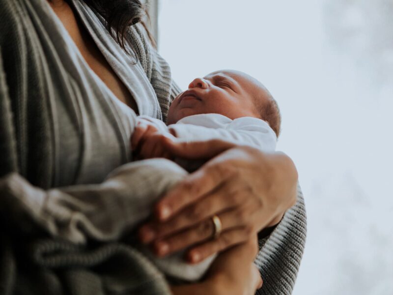 1800x1200 woman holding baby other